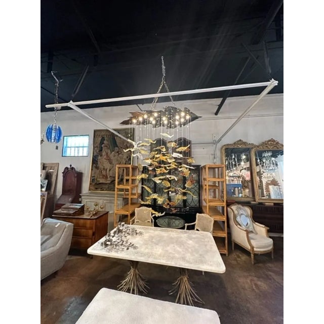 Fabulous modern Murano glass and brass autumn leaf suspension chandelier. Creates a gorgeous effect of floating leaves. A...
