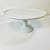 This large Cake Stand from Pottery Barn celebrates the beauty of minimalist service ware in a LeBlanca Porcelain. The...