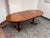 Design Plus Gallery presents an Extension Dining Room Table. This vintage dining table is supported by a double pedestal...