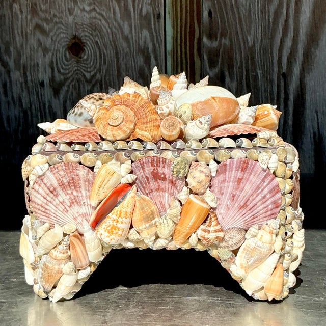 Bring seaside charm to your home with this Vintage Coastal Shell Encrusted Box. Handcrafted with an array of natural...