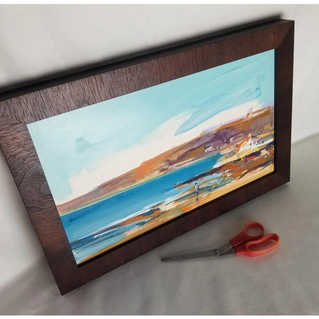 Painting by a Portuguese artist on heavy paper recently framed with a dark wood moulding. We just love the colors! We have...