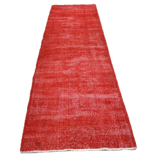 Hand-knotted with care using traditional rug-making techniques, this wool rug blends timeless craftsmanship with a modern...