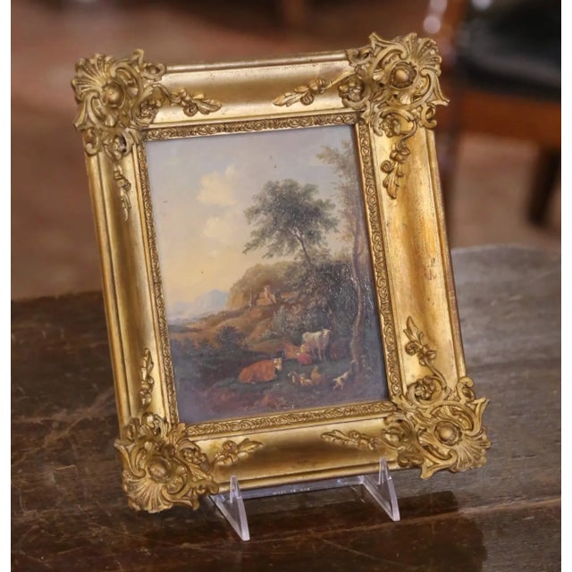 This charming 19th-century French landscape painting is executed on board and protected under glass within a finely cast...