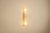 Italian lighting from the 1970s often combined architectural forms with exceptional glassmaking. This large wall lamp,...