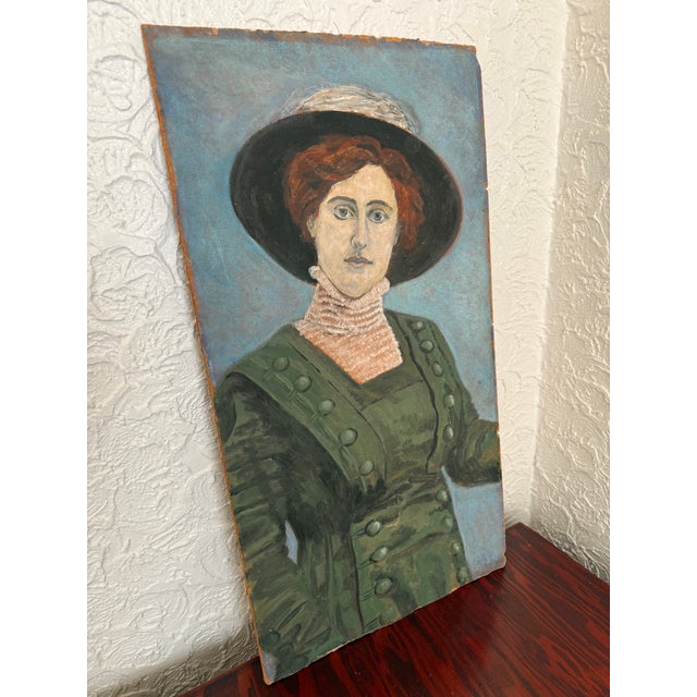 Antique portrait painting of a lady in Edwardian dress, painted on board with oil pastels and paints in a naive folk art...