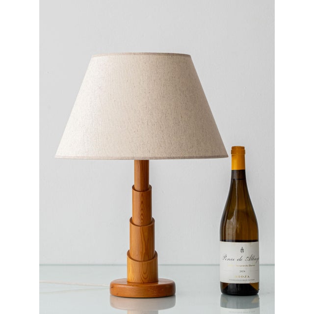 Scandinavian Modern solid pine table lamp, 1970s — a sculptural stacked base in solid pine. New E27 socket and lampshade....