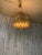 Golden brass brutal design pendant light for Moe lighting. Very intricate six sided chandelier with six light bulbs...