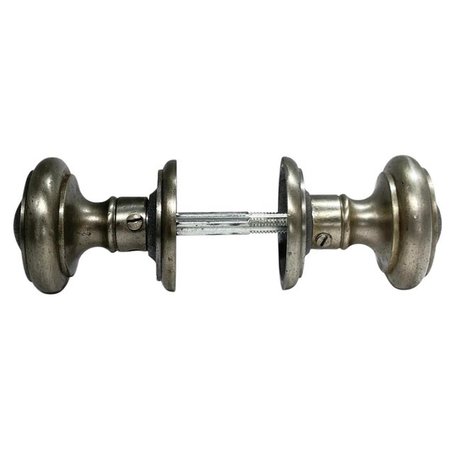 Add a streamlined Art Deco touch to your favorite door with these solid cast brass nickel-plated American door knobs with...