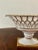 A gorgeous white & gold regency style reticulated porcelain basket compote Circa late 20th century Measures: 7.88"W x...