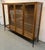 Original Broyhill Brasilia glass-top hutch from the iconic Brasilia collection, crafted in the 1960s. This upper display...