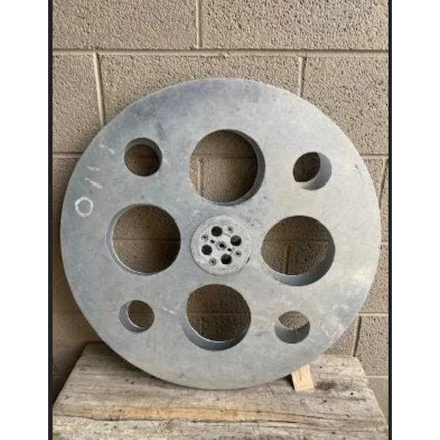 A 1940s XL Goldberg aluminum movie reel from Denver — a 26-inch piece of cinema history. Fascinating industrial decor for...