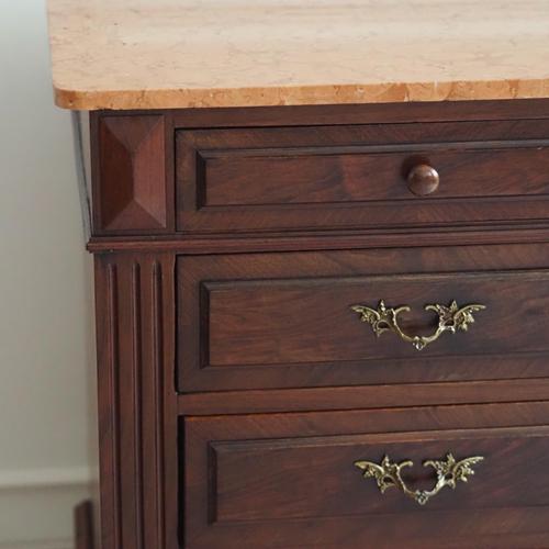 A gründerzeit-era chest of drawers in the historicist style, circa 1880, with walnut veneer, oak drawers, and a marble...