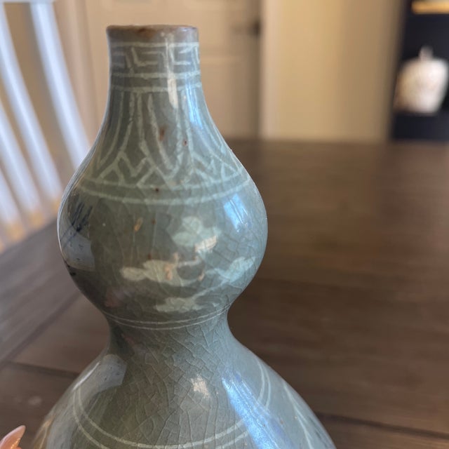 An exceptional and highly unusual 20th-century studio pottery double-gourd vase. This striking piece beautifully bridges...