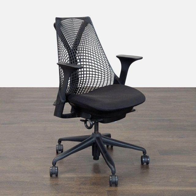 This Herman Miller chair features a breathable mesh back for good support and comfort. It includes adjustable armrests and...