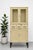 Metal Art Deco medical cabinet showcasing classic Industrial design, c. 1930’s. This substantial piece retains its...