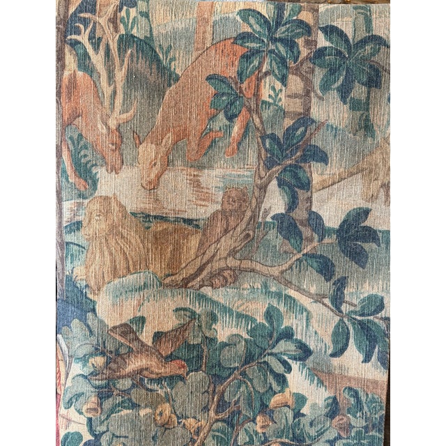 A richly detailed French tapestry dating to the 1950s, depicting an elaborate medieval hunting procession set within an...
