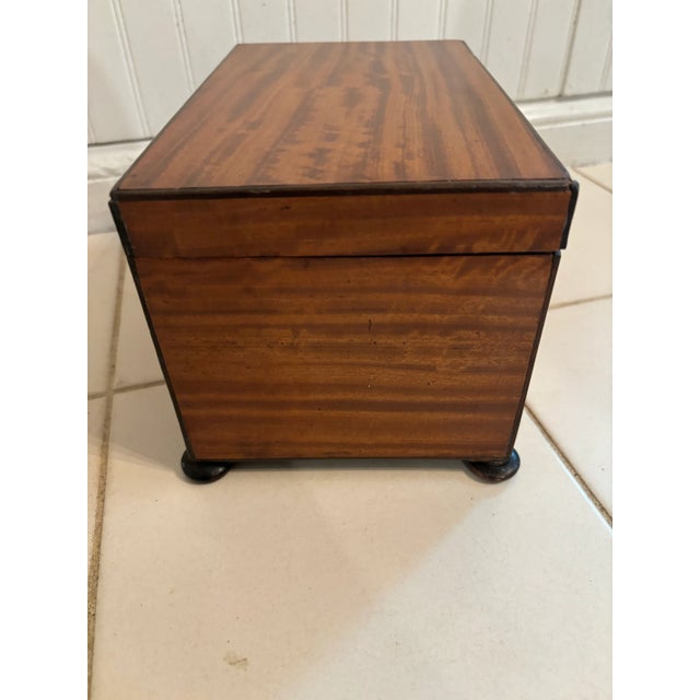 A beautiful George III Satinwood Tea Caddy dating from 1800-1810, the highly figured golden Satinwood edged all around...