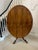 Exceptional quality antique Victorian rosewood centre/dining table having an outstanding quality oval rosewood top with a...