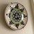 Small hand-painted Polish stoneware pottery plate made by Manufaktura in Bolesławiec. A cobalt peacock eye medallion is...