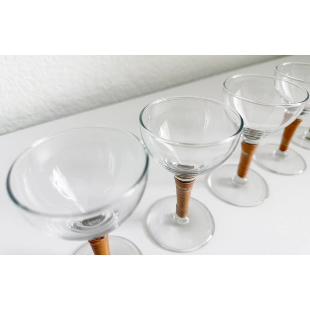 Set of five Mid-Century Modern, Carl Auböck style clear glass and rattan wrapped aperitif or cordial cocktail glasses...