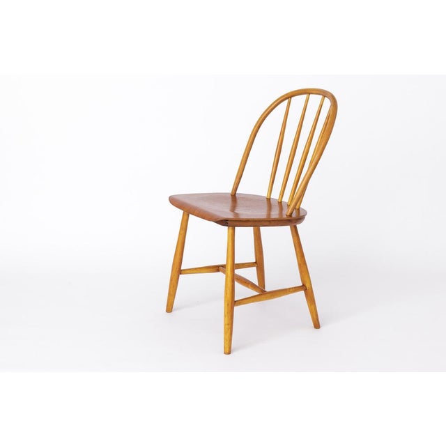 Vintage Dining Chair by manufacturer Nesto from the 1960s. This elegant chair features a sturdy frame crafted from teak...