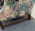 Handsome well proportion Chippendale style Camel back loveseat with molded legs and a stretcher base. Loveseat has a down...