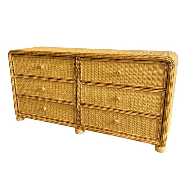 Late 20th century vintage rattan 6 drawer dresser. Spacious drawers that move on slides ease. Solid well built piece that...