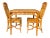 A rare hand-carved faux bois game table with two chairs from the Reagan collection by McGuire. The detail and...