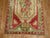 A full pile vibrant colored Turkish Ghiordes rug from the early stages of the 20th century. 3'11'' x 6'