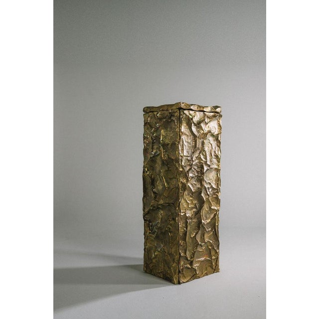 Golden peak brass monolith by zincutec dimensions: w 100 x d 30 x h 30 cm materials: brass a monolith of brass, shaped by...