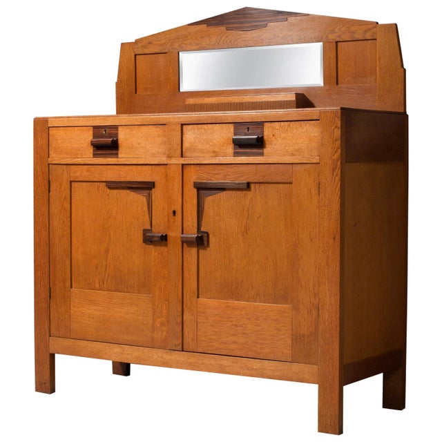 Very well-preserved Art Deco bar cabinet from the late 1920s. This high cabinet has a lot of typical details from the...