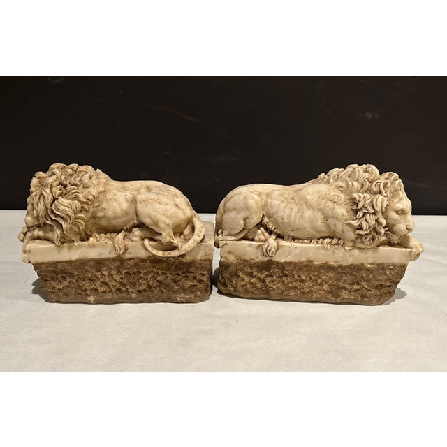 Fine quality antique carved marble recumbent lions after models by Antonio Canova. Architectural elements most likely part...