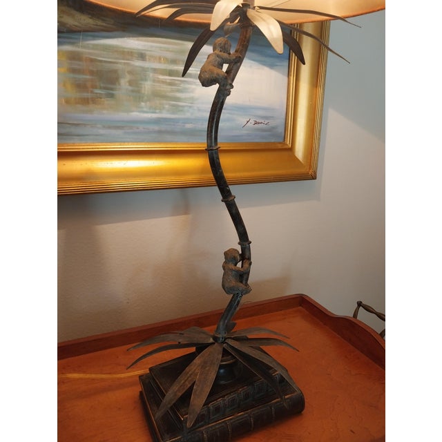 This rarely found version of climbing monkeys on a palm tree atop a stacked book base is both elegant and whimsical. There...