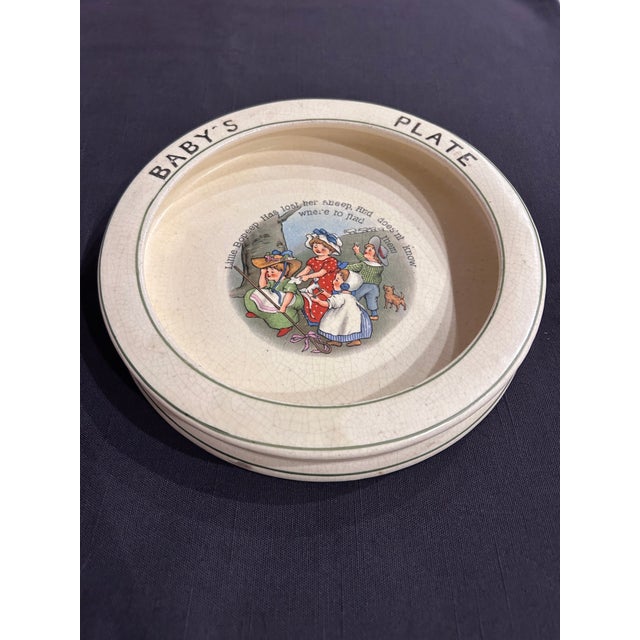 Antique Roseville Pottery Baby’s Plate featuring the classic “Little Bo Peep” nursery rhyme illustration, circa 1895–1910....