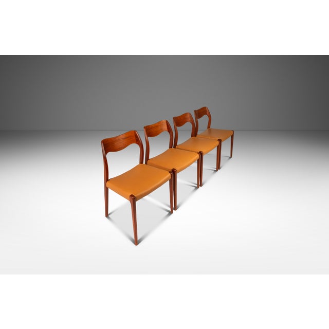 This distinguished set of four Model #71 dining chairs, attributed to Niels Otto Møller for J.L. Møllers Møbelfabrik in...