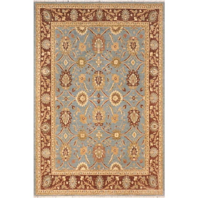 This gorgeous transitional handmade rug follows an abstract pattern which exotically repeat like a continuous reflection....