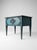 This striking hand-painted end table or night stand features an elegant teal-blue finish with carved detailing and luxe...