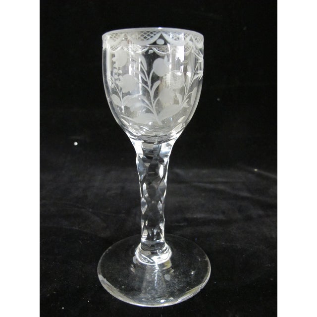 Antique, 18th century (possibly 17th) mead glass. Clear glass with engraved flower and leaf design accented by lace trim...