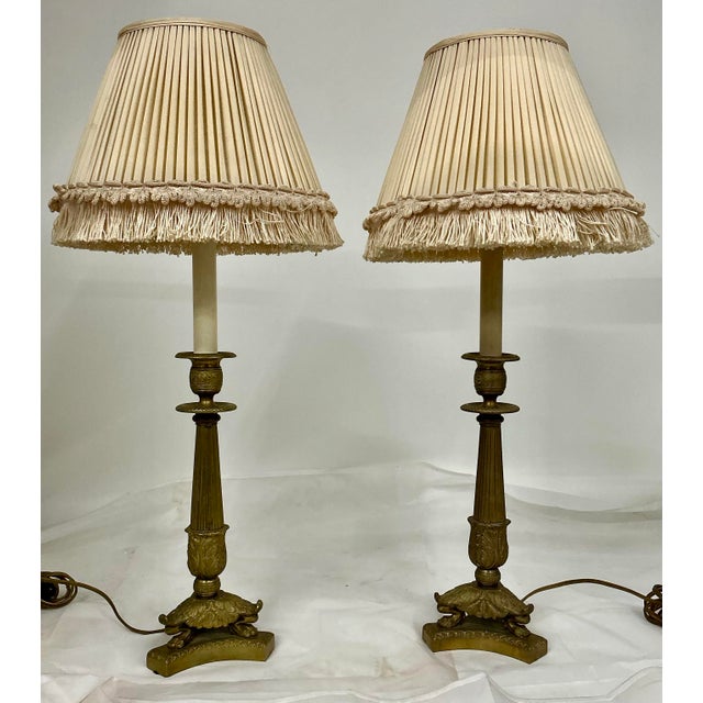 Great pair of antique French petite lamps . Vintage custom shades are stained inside, but can be included with no...