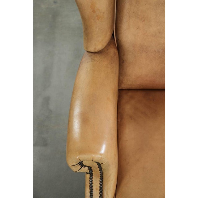 Animal Skin Light Cowhide Wing Armchair with a Timeless English Look and Good Seating Comfort For Sale - Image 7 of 14