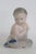 This adorable Little Mermaid Figurine is made out of porcelain. This lovely miniature piece was made by Royal Copenhagen...