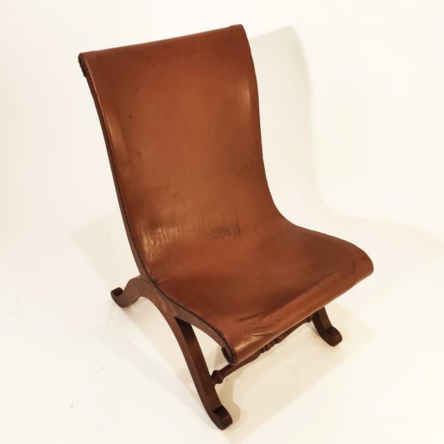 Spanish auxiliary chair designed by Pierre Lottier for Valenti, 1950s. Oak wood structure with curved and harmonious lines...