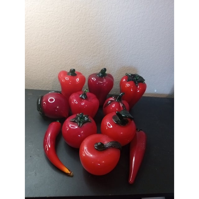 EXQUISITE LOT of 11 Red Art Glass Fruits & Veges This exquisite lot of 11 red art glass fruits and vegetables is sure to...