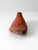 Antique early 20th-century wooden shoe last with red-painted detailing, handwritten markings, and a metal heel plate. Its...
