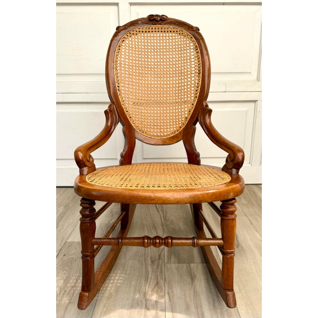 Antique Victorian Carved Wood Hand-Caned Rocking Chair For Sale - Image 4 of 17
