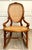 Antique Victorian Carved Wood Hand-Caned Rocking Chair For Sale - Image 4 of 17
