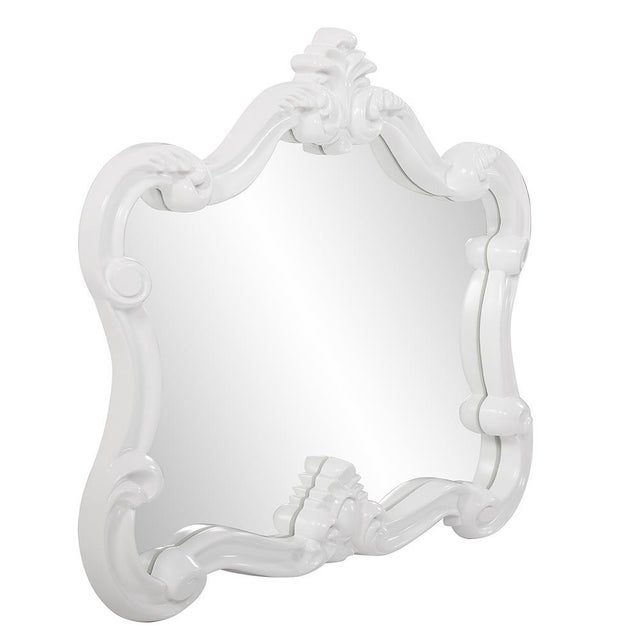 The Veruca Mirror is a lovely piece featuring an ornate, textured frame adorned with decorative flourishes. The entire...