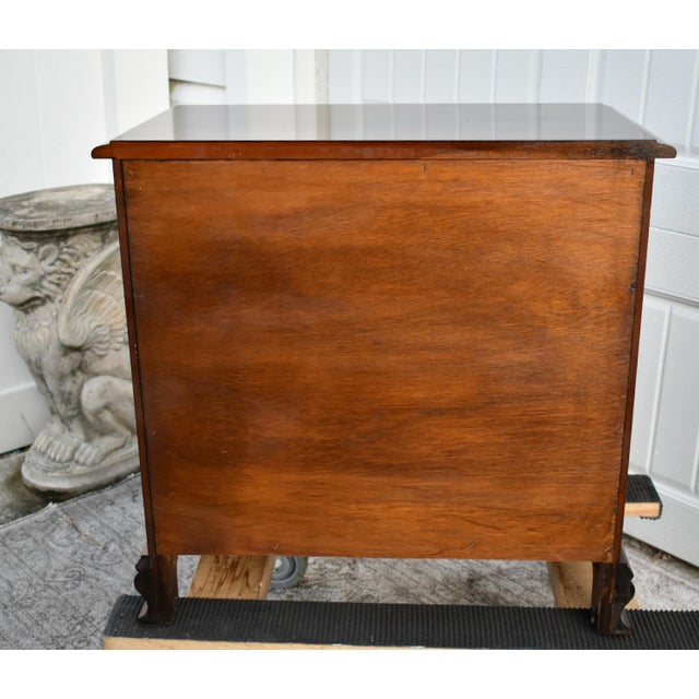 Vintage (1980's) Bachelors Chest has a Traditional Style. Made of Wood. CherryWood. The Chest has Four Drawer with Brass...