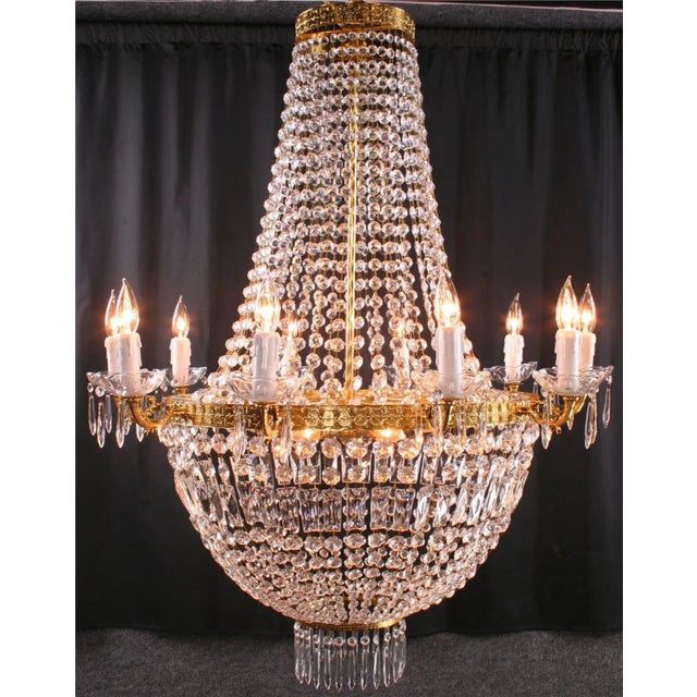 Item #: P-42 Overall measurements (inches) 41H x 35.50W x 35.50D. This newly crafted Italian cut glass 11-arm chandelier...