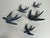 Original vintage ceramic wall swallows with iridescent porcelain. 5 pieces in 3 sizes and 2 nests (wall nest and corner...